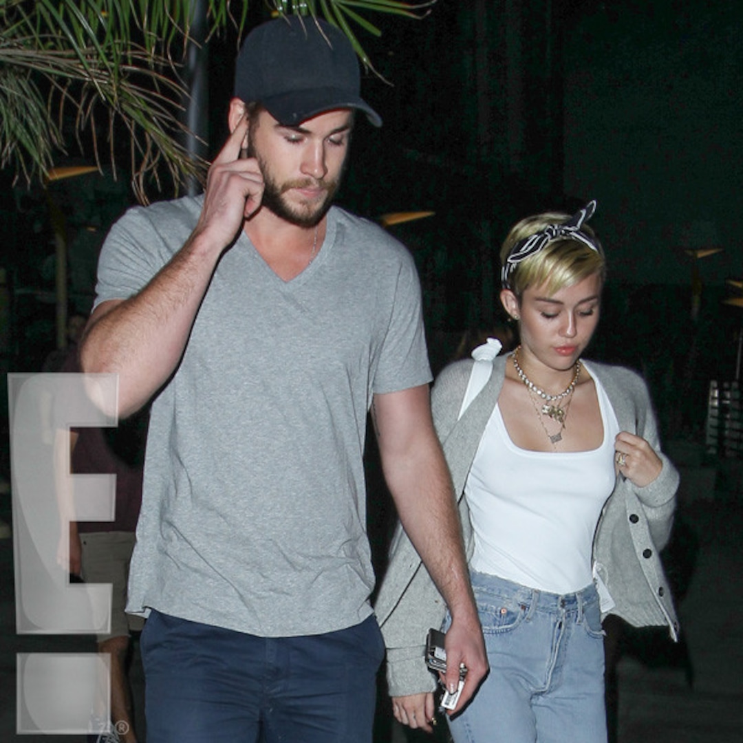 Photos from Miley Cyrus & Liam Hemsworth's Movie Date - E! Online